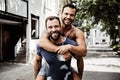 A Portrait of a happy gay couple outdoors in urban background Royalty Free Stock Photo