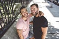 A Portrait of a happy gay couple outdoors in urban background Royalty Free Stock Photo