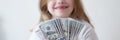 Portrait of happy girl holding cash dollars Royalty Free Stock Photo