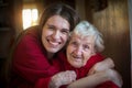 Portrait of happy Girl hugging her grandmother. Royalty Free Stock Photo