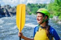 Portrait of happy girl kayaking on the river on a sunny day during summer vacation Royalty Free Stock Photo