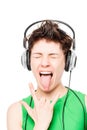 Portrait of happy girl loves hard rock with headphones Royalty Free Stock Photo