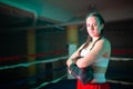 Portrait of happy girl posing on boxing ring Royalty Free Stock Photo