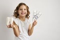 Portrait of happy girl with white teeth and dollar bills Royalty Free Stock Photo