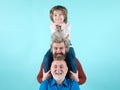Portrait of happy grandfather father and son smilind. Fathers day concept. Man in different ages. Funny men faces. Royalty Free Stock Photo