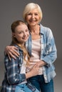 Portrait of happy grandmother and granddaughter embracing Royalty Free Stock Photo