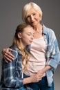 Portrait of happy grandmother and granddaughter embracing Royalty Free Stock Photo