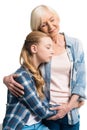 Portrait of happy grandmother and granddaughter embracing Royalty Free Stock Photo