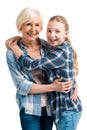 Portrait of happy grandmother and granddaughter embracing Royalty Free Stock Photo