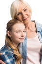 Portrait of happy grandmother and granddaughter embracing Royalty Free Stock Photo