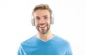 Portrait of happy guy listening to music. Guy with smiling face wearing headphones for music Royalty Free Stock Photo