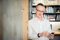 Portrait of happy handsome businessman wearing glasses and white shirt Royalty Free Stock Photo