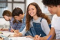 Portrait of happy high school girl studying in class Royalty Free Stock Photo