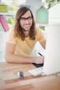 Portrait of happy hipster at computer desk Royalty Free Stock Photo