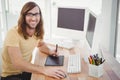 Portrait of happy hipster with graphics tablet Royalty Free Stock Photo