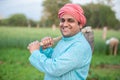 Portrait of happy indian male farmer labor worker holding Pretail Garden Spade Shovel or agricultural tool