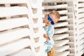 Portrait of happy joyful beautiful little boy wearing blue mirror sunglasses Royalty Free Stock Photo