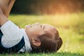 Portrait happy kids on green grass in the park