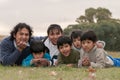 Happy Latin family in the park