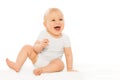 Portrait of happy laughing baby in white bodysuit