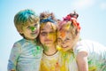 Portrait of a happy laughing children. Smiling kids with face art painting. Child huds with funny face painting.