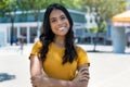 Portrait of happy laughing mexican young adult woman with long black hair Royalty Free Stock Photo