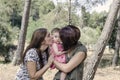 Portrait of happy lesbians mothers with a baby. Homosexual fami Royalty Free Stock Photo