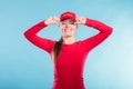 Portrait of happy lifeguard woman in red cap. Royalty Free Stock Photo