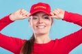 Portrait of happy lifeguard woman in red cap. Royalty Free Stock Photo