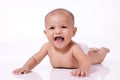 Portrait of happy little asian baby girl smile face down on white floor Royalty Free Stock Photo