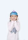 Portrait of happy little Asian child girl with wearing a crown toys isolated over white background Royalty Free Stock Photo