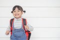 Portrait of happy little Asian child on white background