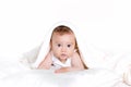 Portrait of happy little baby boy sitting on the floor isolated on white background. Studio portrait. Royalty Free Stock Photo