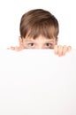 Portrait of happy little boy with white blank Royalty Free Stock Photo