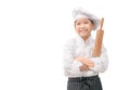 Portrait Happy little chef in uniform holding rolling pin isolated Royalty Free Stock Photo