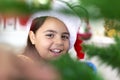 Portrait of happy little girl at Christmas time