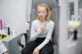 portrait happy little girl patient ophthalmology clinic, vision test in progress cheerful child an optometric