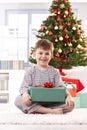 Portrait of happy little kid in christmas morning