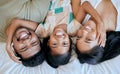 Portrait of happy or love family lying cosy on bed while bond together at home. Loving parents spending quality time Royalty Free Stock Photo