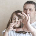 Portrait of happy loving family. Father and his daughter child girl playing. Cute baby and daddy. Concept of Father day. Family Royalty Free Stock Photo