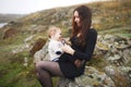 Portrait of happy loving mother and her baby outdoors Royalty Free Stock Photo