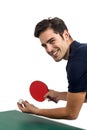 Portrait of happy male athlete playing table tennis Royalty Free Stock Photo