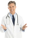 Portrait Of Happy Male Doctor Gesturing Royalty Free Stock Photo