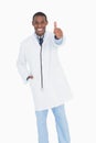 Portrait of a happy male doctor gesturing thumbs up Royalty Free Stock Photo