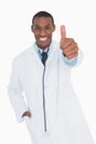 Portrait of a happy male doctor gesturing thumbs up Royalty Free Stock Photo