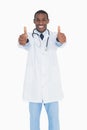 Portrait of a happy male doctor gesturing thumbs up Royalty Free Stock Photo