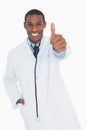 Portrait of a happy male doctor gesturing thumbs up Royalty Free Stock Photo