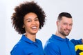 Portrait Of Happy Male And Female Janitors Royalty Free Stock Photo