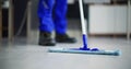 Portrait Of Happy Male Janitor Cleaning Floor Royalty Free Stock Photo