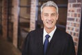 Portrait of happy male lawyer in office Royalty Free Stock Photo